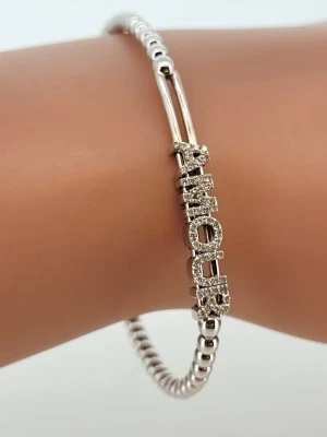 0.23ct Diamond & 18ct White Gold "Amour" Ball Bangle 7.9g